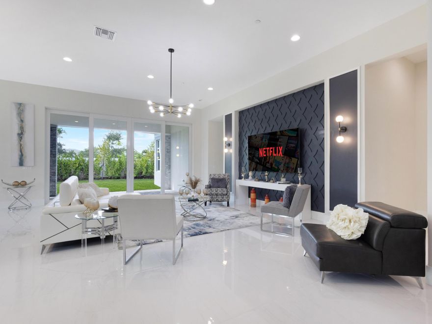 ''Welcome to Coral Isles, a luxurious gated community within Avenir in Palm Beach Gardens, featuring only 107 homes. This stunning two-story Domenica floor plan home, built in 2025, boasts 5 bedrooms, 6 bathrooms, and a 3-car garage on over 1/3 acre of land. The open-concept floor plan showcases a primary suite with 2 spacious walk-in closets, a spa-like bath with dual vanities, a freestanding soaking tub, and a walk-in shower. The media room offers flexibility, perfect for an exercise room, playroom, office, or game room. Also a guest bedroom for convenience in the 1st floor ,The gourmet kitchen features an expansive island with quartz countertop seating 10, gorgeous flat-panel cabinetry, and top-notch appliances. Upstairs, three guest suites offer ensuite baths and walk-in closets,    with a shared loft area for relaxation. The oversized yard is perfect for a pool, and the homesite is adjacent to a lovely neighborhood green space and within walking distance to the Avenir clubhouse and amenity center. Enjoy resort-style living with access to a 16,000 sq ft clubhouse, complete with a swimming pool, waterfalls, and spa, as well as tennis and pickleball courts, tot lots, and a fitness center. Avenir's Town Center offers restaurants, shops, and a dog park, with nearby access to beaches, nature preserves, and golf courses