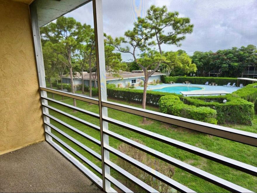Unit is bright & clean and ready to rent out immediately!  Balcony with a pool view : )Your Own Tropical Getaway Awaits!Step into this vibrant and spacious 1 bedroom, 1.5 bathroom condo with an awesome pool view that makes every day feel like vacation! Enjoy morning coffee or sunset vibes on your back patio overlooking the sparkling pool ...pure relaxation!Located in a friendly, all-ages community in sunny Palm Springs, Florida