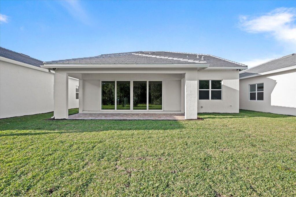 Photo of 9915 SW Meridian Way, Stuart, FL 34997 (MLS # R11049111)