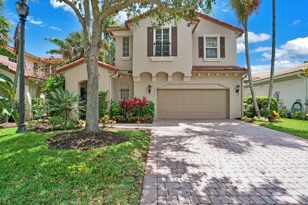 Photo of 1820 Flower Drive, Palm Beach Gardens, FL 33410 (MLS # R10800581)