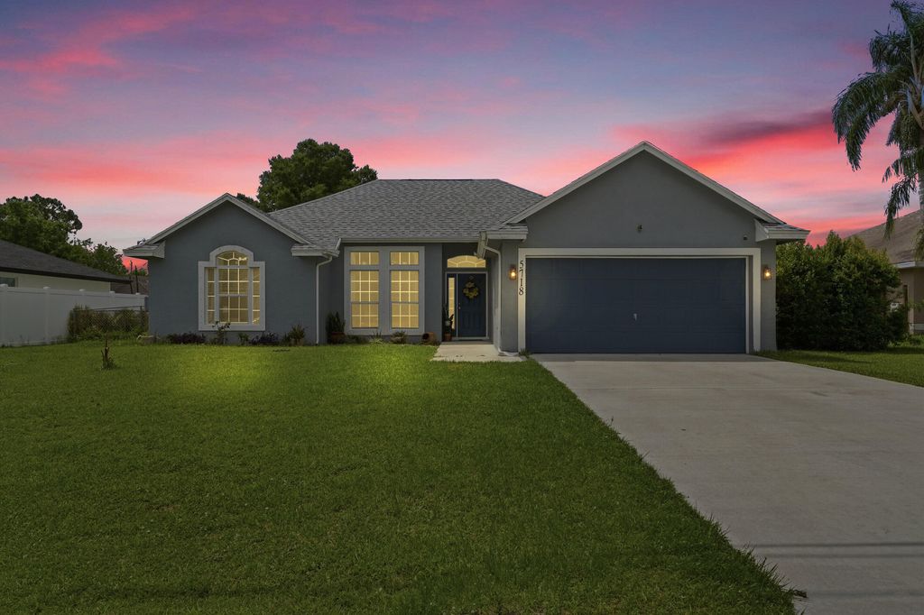 Photo of 5718 NW Alcazar Terrace, Port Saint Lucie, FL 34986 (MLS # B26025631)