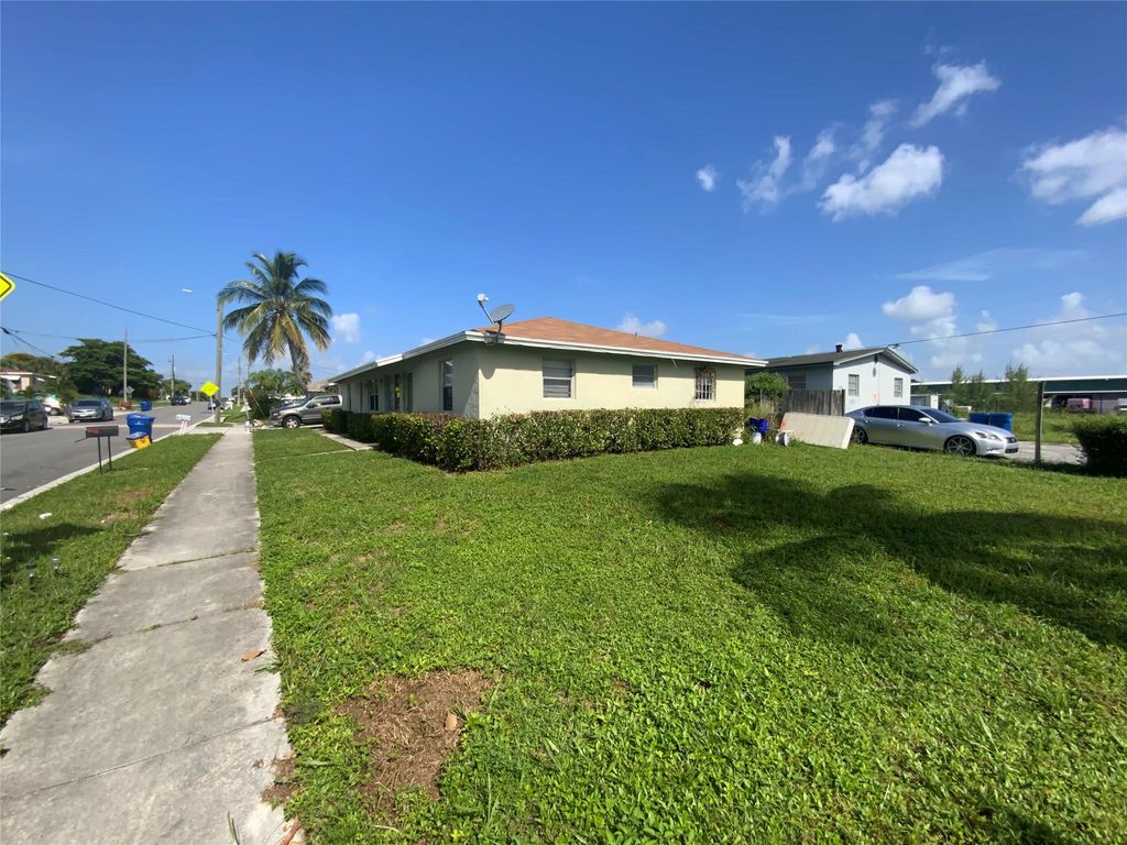 Photo of 800 W 10th St #1, Riviera Beach, FL 33404 (MLS # F10395802)