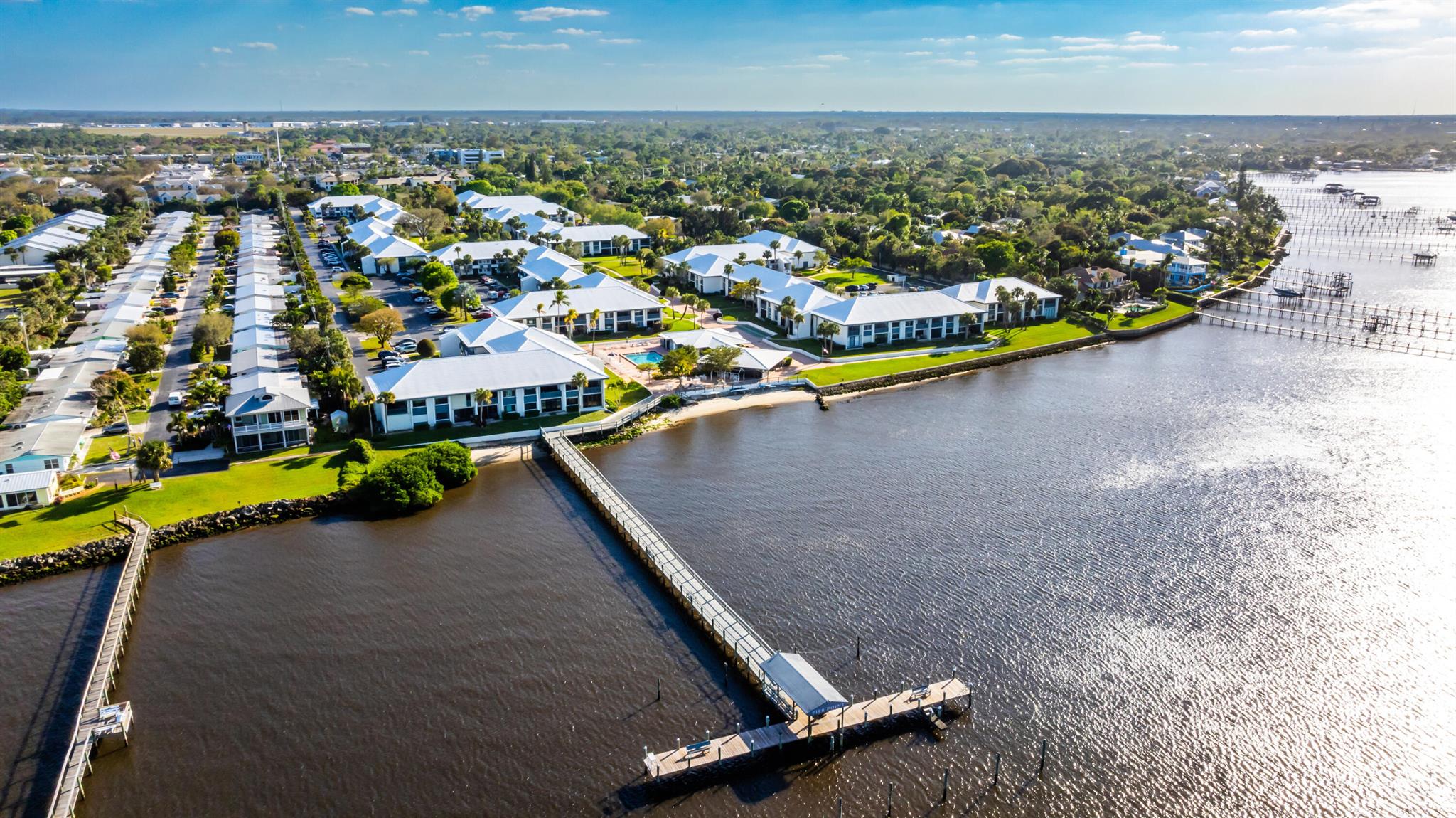 Turnkey Waterfront Living in Downtown Stuart at Pierpoint Yacht Club. CORNER WATERFRONT Rental is available January 1st with ALL UTILITIES INCLUDED! Enjoy the BEST of Florida living with this furnished 2-bedroom, 2-bath, CORNER UNIT including a private screened balcony which overlooks the pool and river in the heart of Downtown Stuart. Extra windows add a light and bright atmosphere with water views while the balcony is perfect for morning coffee and stunning sunsets. The convenient location allows easy access to the Riverfront Clubhouse, Pool, and Pier. You will love the proximity to the Beautiful Beaches and Historic Downtown Stuart: restaurants and boutique shopping just minutes away.
