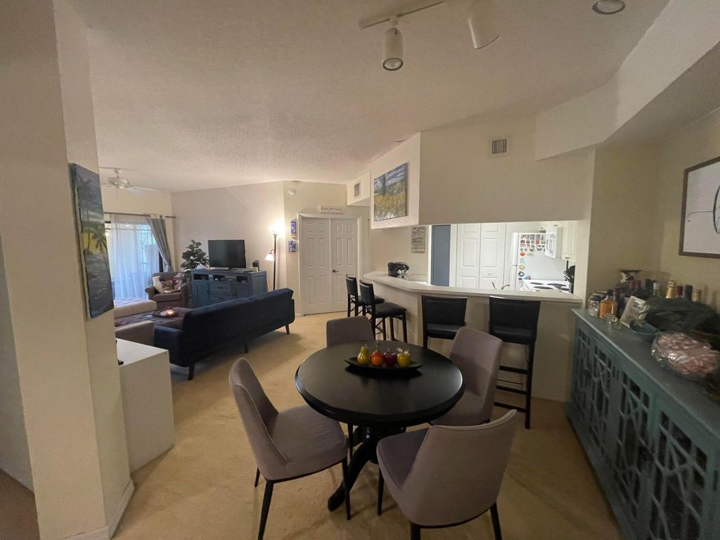 Photo of 3020 Alcazar Place #206, Palm Beach Gardens, FL 33410 (MLS # R10948875)