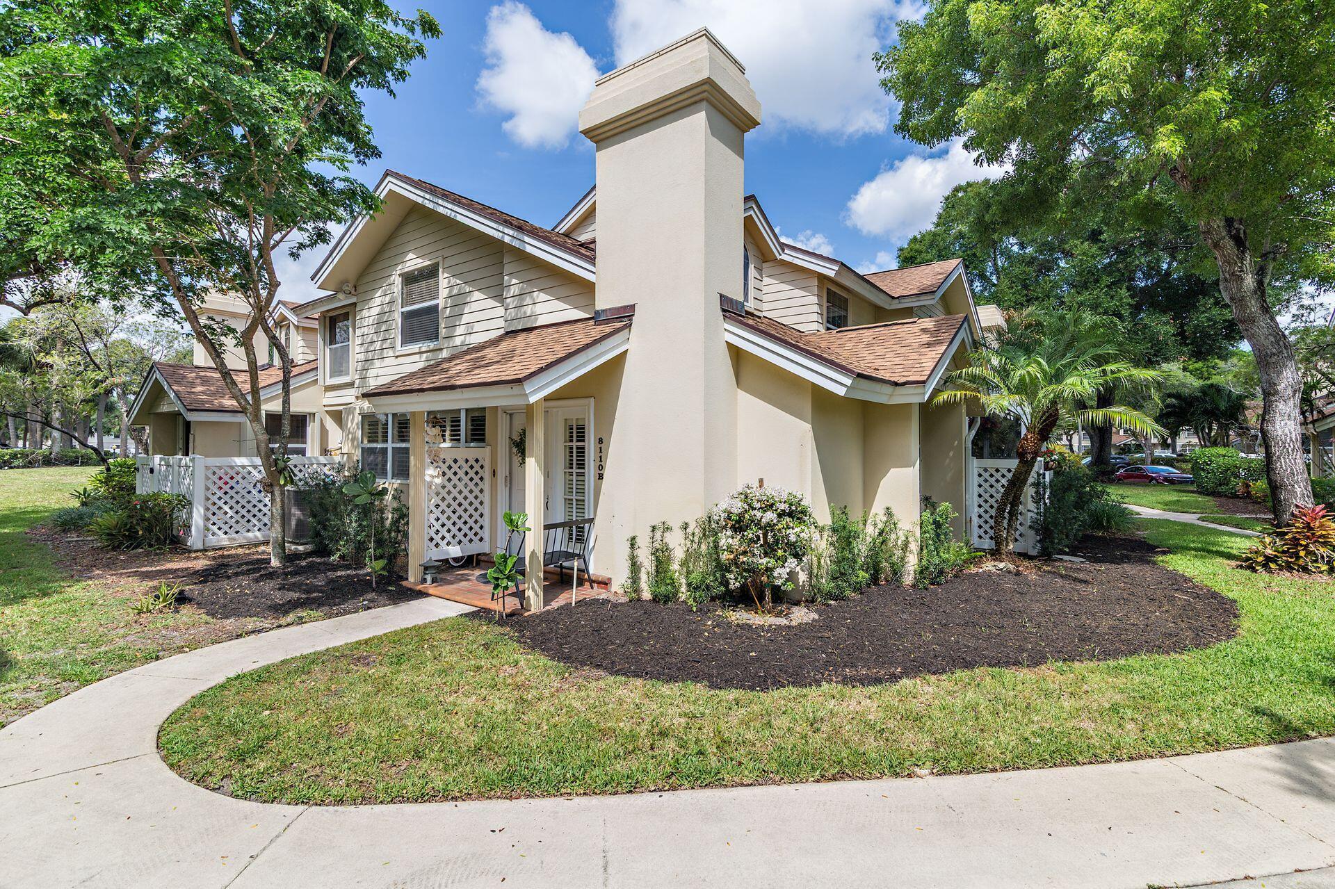 Beautifully updated 3 bedroom, 2-bathroom DiVosta built townhouse in the gated Wellesley at Lake Clarke Shores community. Offering spacious vaulted ceilings and an array of designer finishes including wide plank cherry wood flooring, Bahama shutters, and a chef's kitchen, new roof, new AC and a fully renovated eat-in kitchen. Both bathrooms have been remodeled and expanded providing additional space and storage. The community offers a 24/7 manned security gate, a community pool, tennis courts, playground, walking trails and more. The HOA covers water, sewer, trash, cable, exterior maintenance and insurance, roof maintenance, parking, lawn care, management fees, and reserve funding. Convenient to I-95 and minutes to Palm Beach, downtown West Palm Beach, and the beaches.
