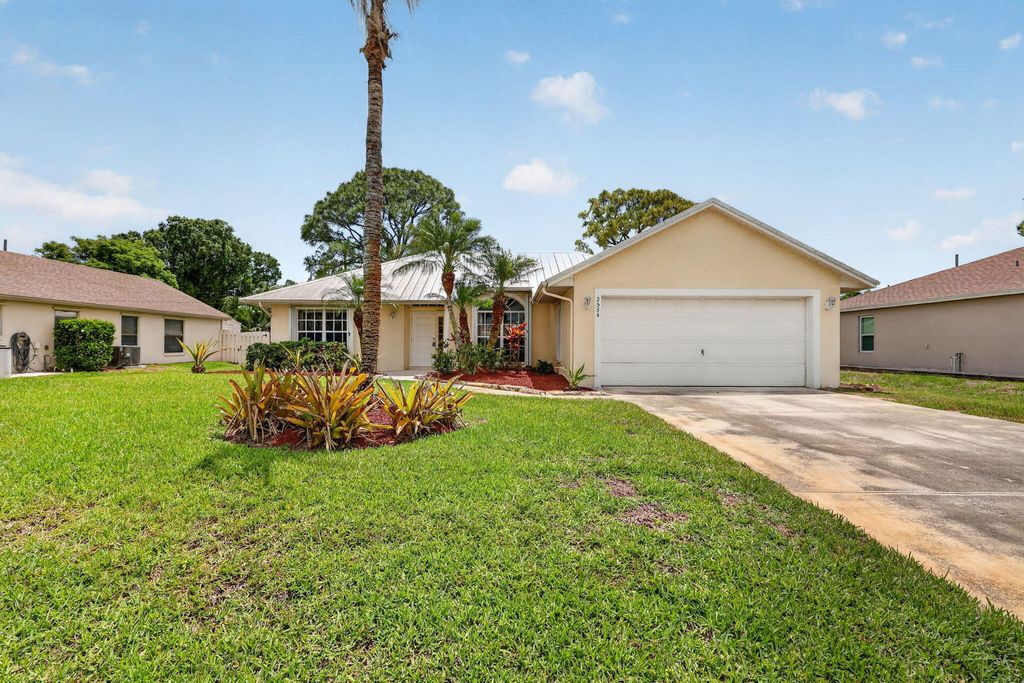 Photo of 2534 SW Grotto Circle, Port Saint Lucie, FL 34953 (MLS # B26020125)