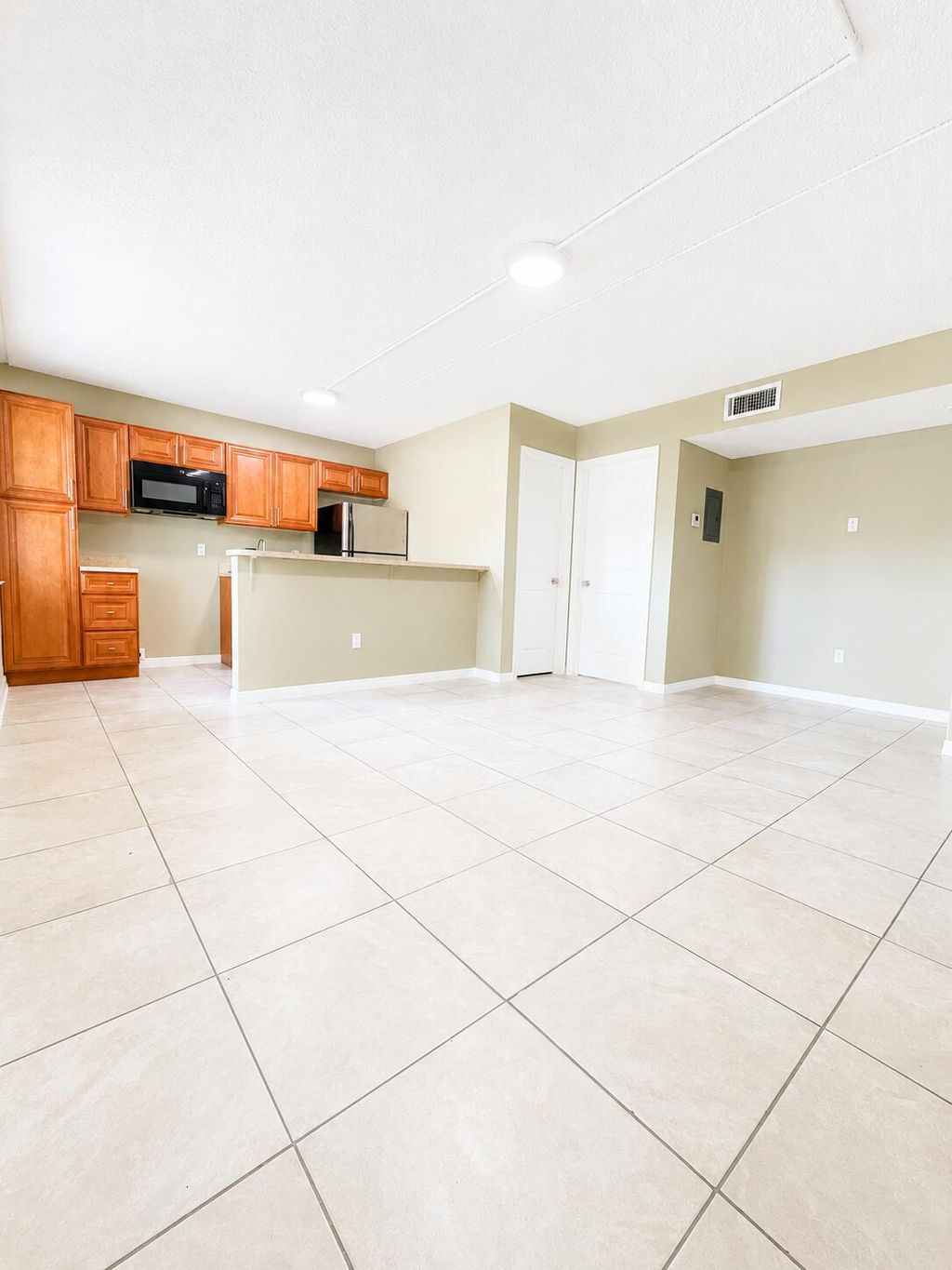 Photo of 1508 NW Avenue D #B10, Belle Glade, FL 33430 (MLS # B26029886)