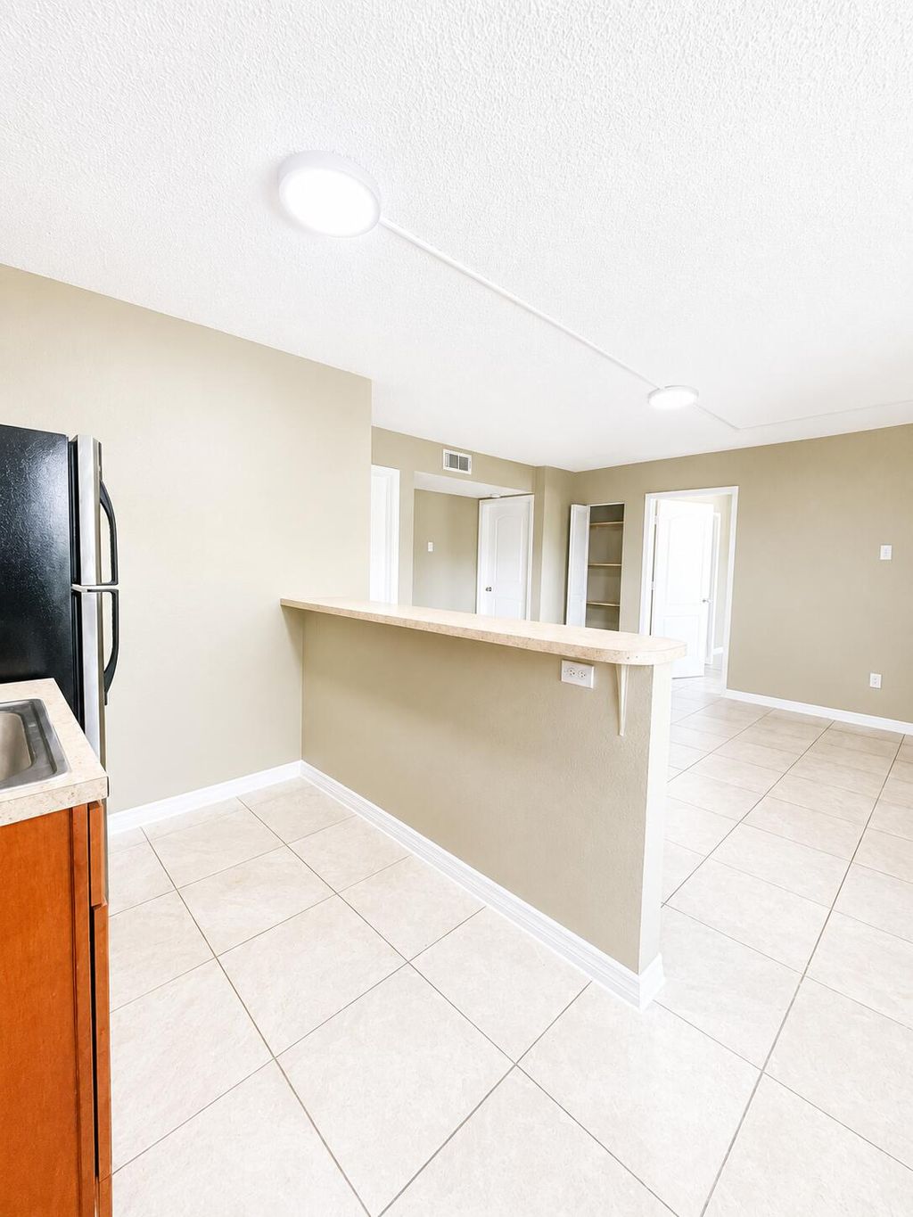 Photo of 1508 NW Avenue D #B10, Belle Glade, FL 33430 (MLS # B26029886)
