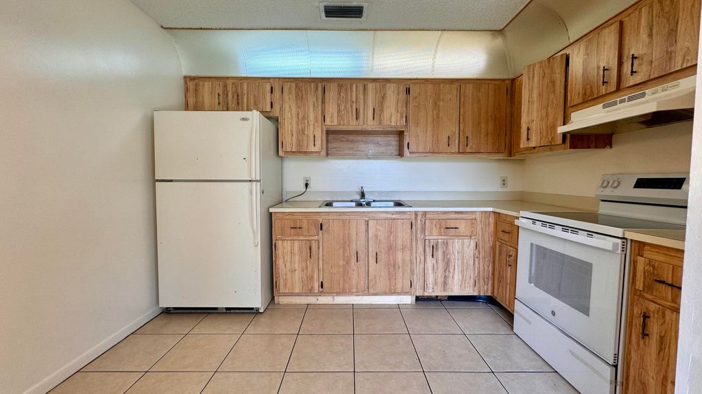 Photo of 3531 Melaleuca Lane, Lake Worth, FL 33461 (MLS # R11015959)