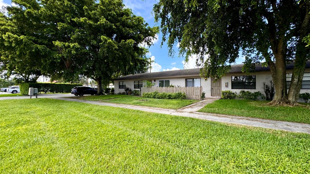 Photo of 3531 Melaleuca Lane, Lake Worth, FL 33461 (MLS # R11015959)