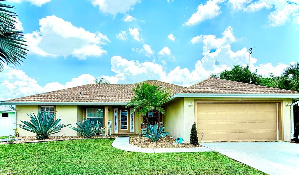 Photo of 127 NW Avens Street, Port Saint Lucie, FL 34983 (MLS # B26032160)