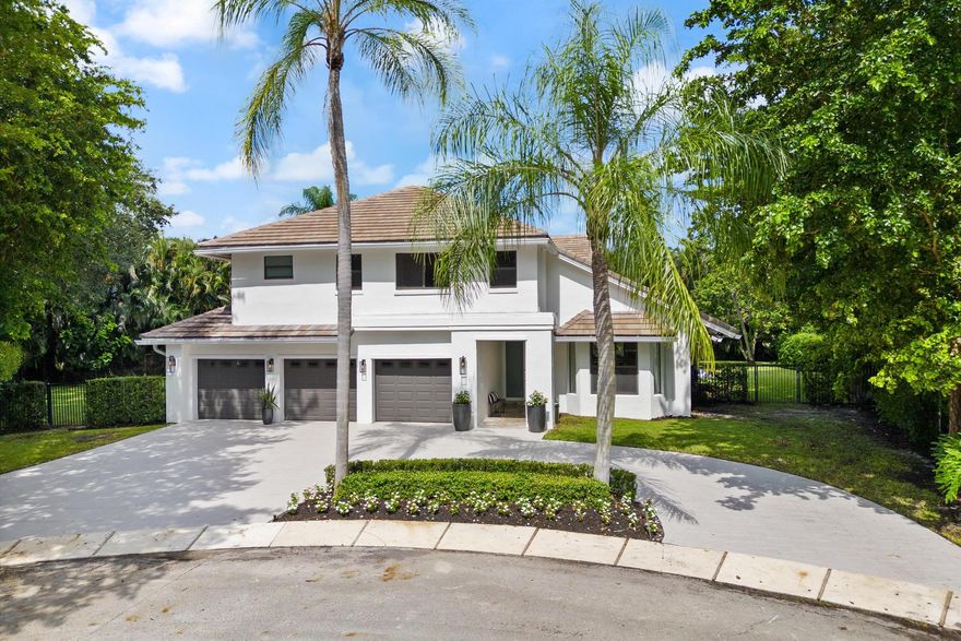 This is a rare, beautifully remodeled 5 bedroom, 4.5 bath home sitting on .416 acres in the prestigious Woodfield Hunt Club. Cul de sac location with pie shaped lot and no rear neighbors. Oversized fenced backyard with lap pool, spa,  marble pavers, covered dining area and a swing set perfect for your family. Boasting Full impact glass and a 4 yr old roof. This home features porcelain tile floors, Viking appliances, Quartzite countertops, volume ceilings, hardwood staircase, wood burning fireplace, spacious Master bedroom with sitting area, dual Master bath vanities and dual showers, large kid's rooms with built out closets, 3 car garage, and circular driveway with plenty of parking. Woodfield Hunt offers 24 hr manned security plus all of the amenities in Boca's top rated school district!