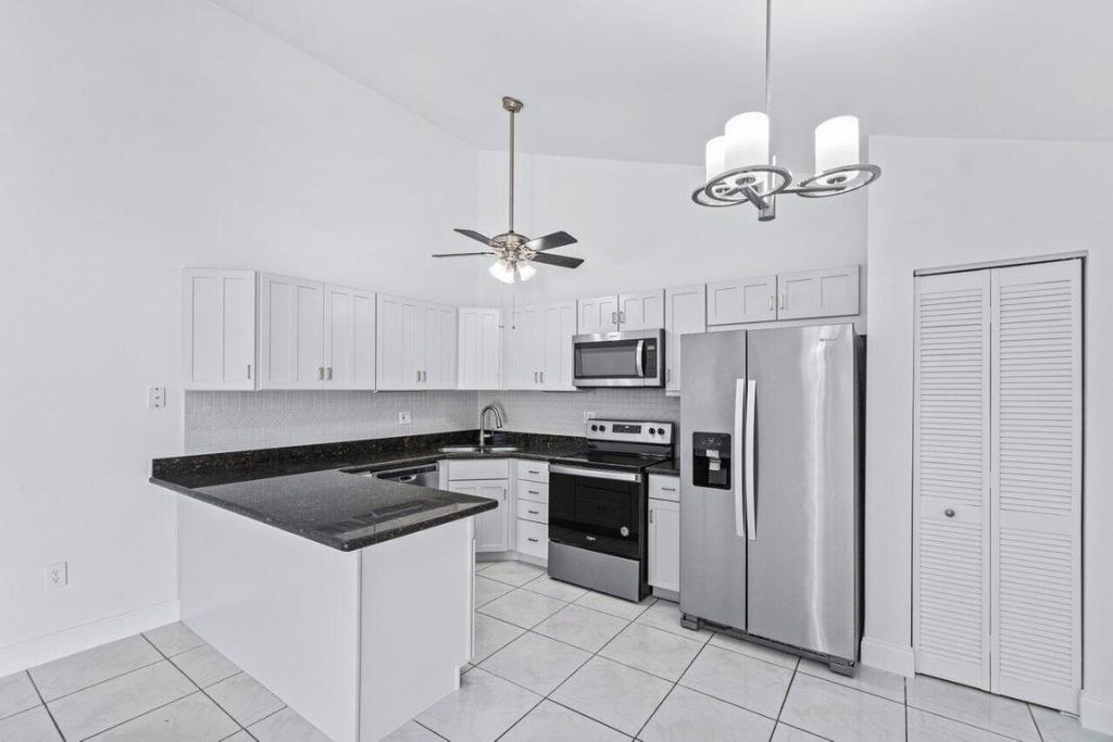 Photo of 9927 Boca Gardens Trail #B, Boca Raton, FL 33496 (MLS # R11052705)