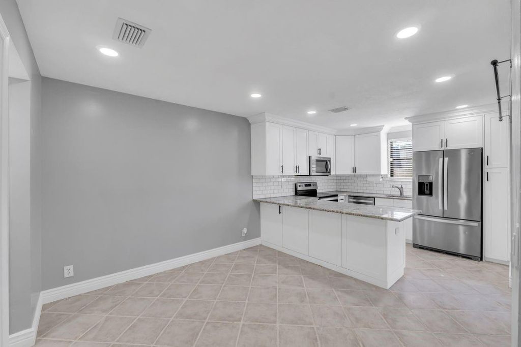 Photo of 2675 NW 99th Avenue, Coral Springs, FL 33065 (MLS # F10543787)