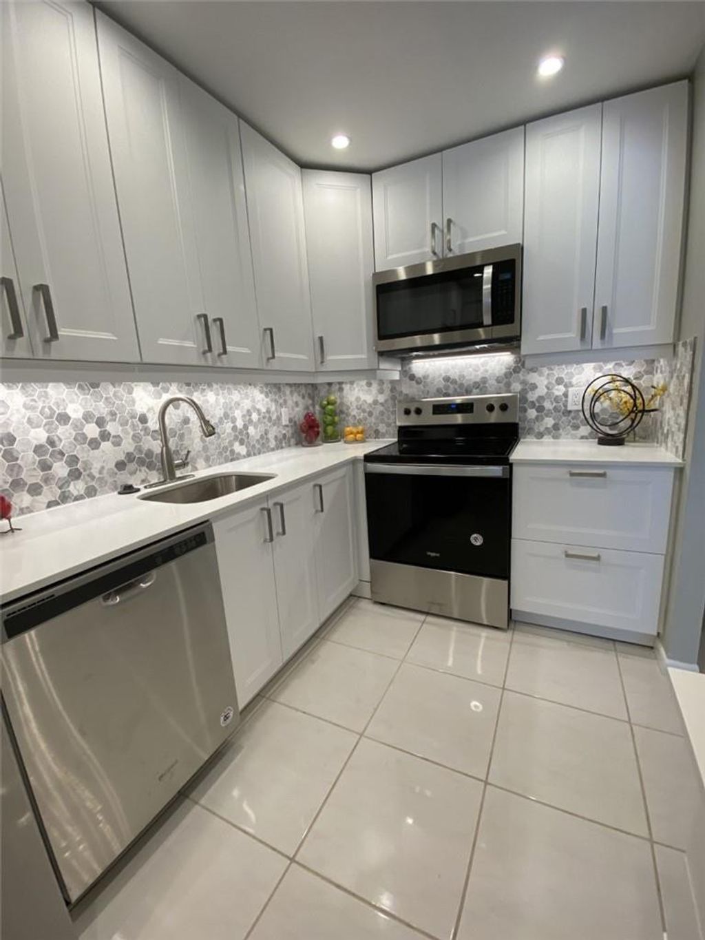 Photo of 21 Jacaranda Drive #124, Plantation, FL 33324 (MLS # F10537528)