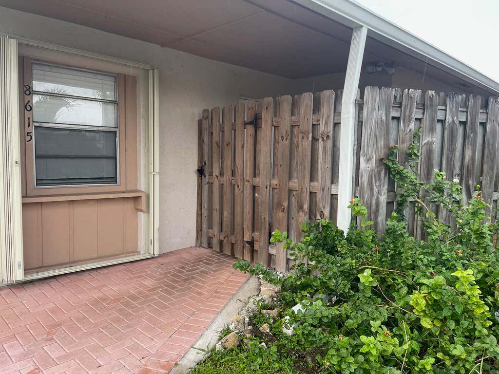 Photo of 8615 Satalite Terrace, Lake Park, FL 33403 (MLS # R11104716)