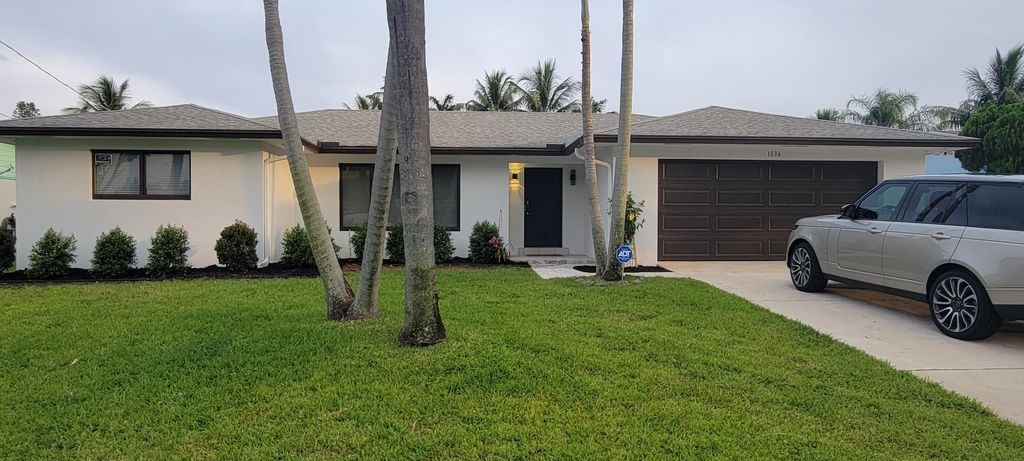 Photo of 1036 SW 26th Avenue, Boynton Beach, FL 33426 (MLS # R11138787)
