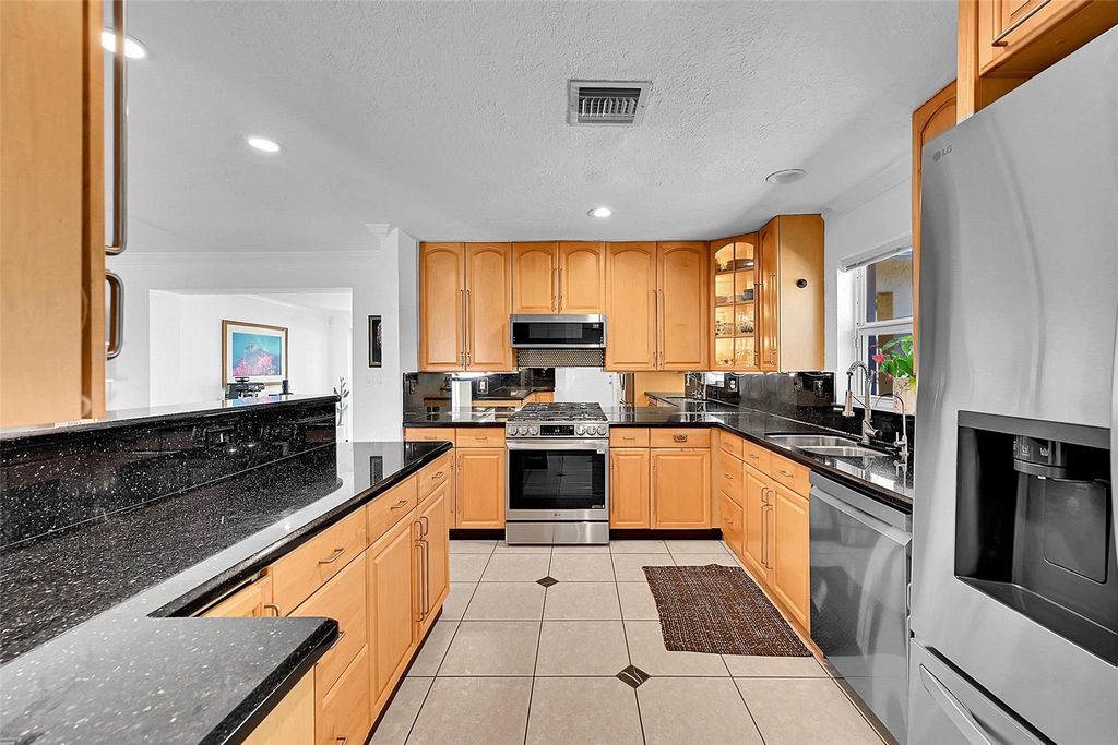 Photo of 281 SW 18th Ct, Pompano Beach, FL 33060 (MLS # F10531600)