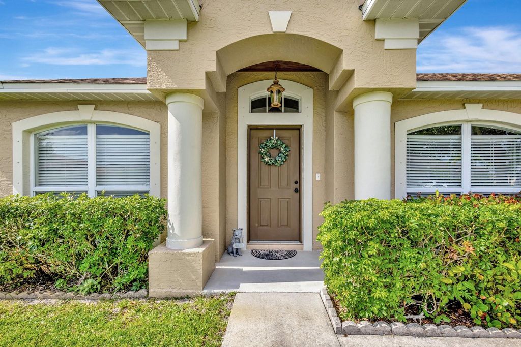 Photo of 602 SW Mccracken Avenue, Port Saint Lucie, FL 34953 (MLS # F10508705)