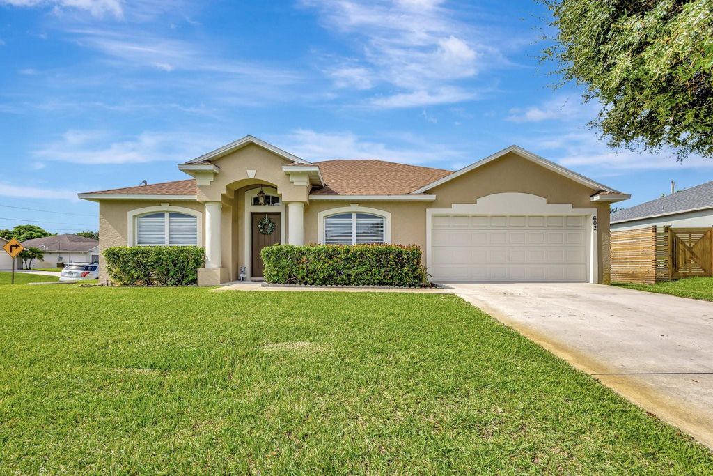 Photo of 602 SW Mccracken Avenue, Port Saint Lucie, FL 34953 (MLS # F10508705)