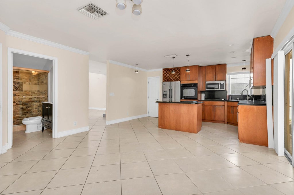 Photo of 5486 NW 44TH Way, Coconut Creek, FL 33073 (MLS # B26061883)