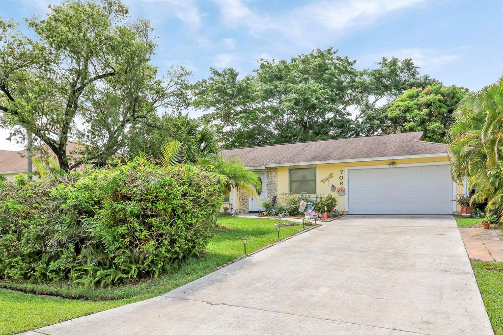 Photo of 708 SE Karrigan Terrace, Port Saint Lucie, FL 34983 (MLS # R11097628)