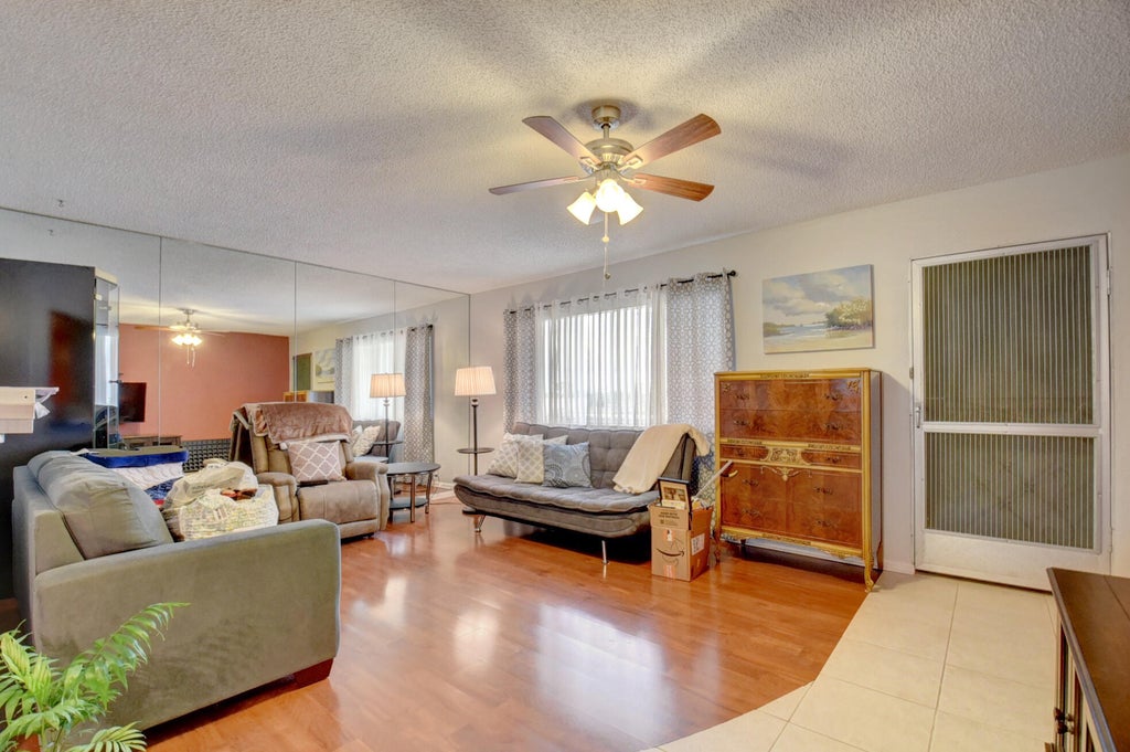 Photo of 400 Village Green Circle W #314, Palm Springs, FL 33461 (MLS # B26078250)