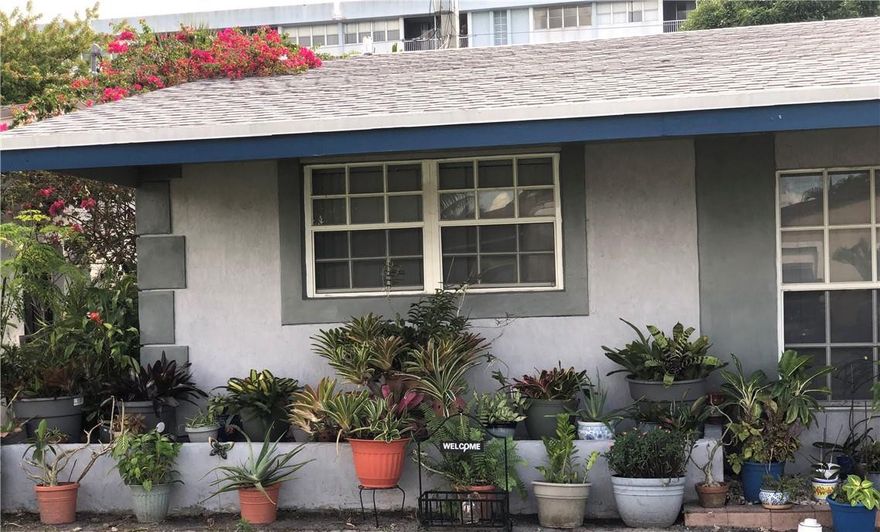 This beautiful home is located in the quiet street of emerald lake drive in Miramar.  It is tiled throughout and slates flooring in the bedrooms.   It features three bedrooms and two completely remodeled bathrooms and a one car garage.The entry door leads to a very welcoming spacious, wide,  open family room; which leads to a oversized family room.  To the right is the formal dining room facing the the open kitchen. Very spacious to host and entertain. The kitchen has modern appliances along with a gas stove. kitchen has a dinette area that sits four people comfortably. the bedrooms can accommodate a king size easily.  The plumbing was redone throughout the entire house, so you will not have to deal with cast iron pipes being rusted.Lots of tropical fruit trees in the back.