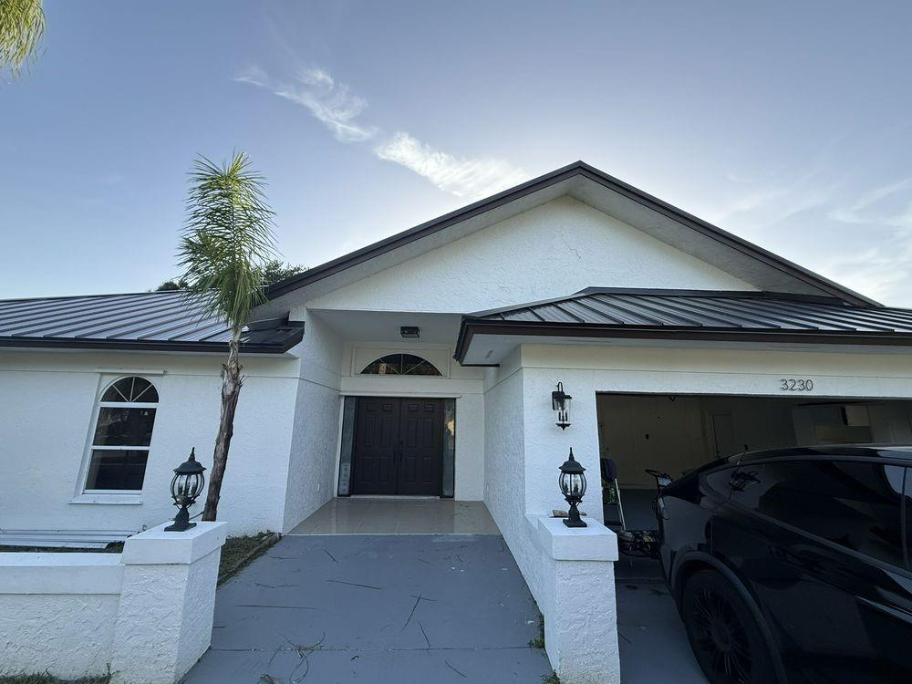 Welcome to your dream home in the heart of Palm City! This move-in ready property has been tastefully upgraded inside and out, offering modern finishes, a functional layout, and peace of mind with major updates already completed. Brand-New AC unit and Metal Roof Long-lasting and low-maintenance for years of worry-free living. Fully Renovated Kitchen New cabinets, updated countertops, and modern fixtures. Updated Flooring Stylish, durable floors throughout the home for a fresh, cohesive look. Bathroom Remodel New shower, updated vanity, and sleek tile finishes. Fresh Interior & Exterior Paint Bright, clean, and ready for your personal touch. Situated in a quiet, well-kept neighborhood. Convenient to top-rated schools, shopping, dining, and major highways.