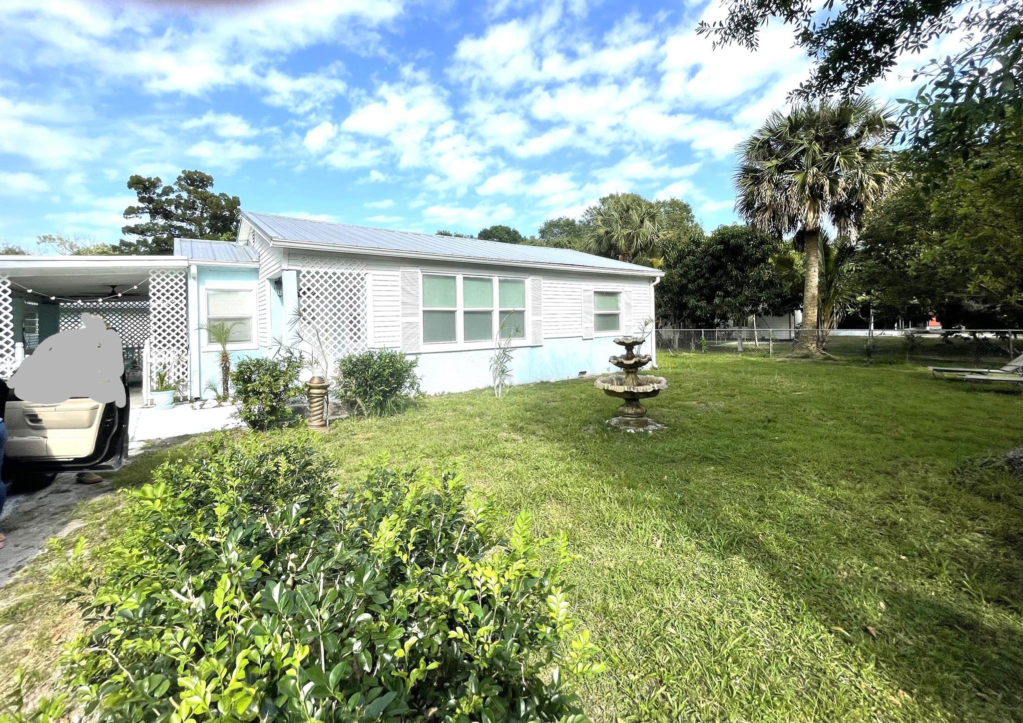 Welcome to a Fort Pierce Gem! Discover the charm of yesteryears with this delightful furnished 3-bedroom, 1-bath rental home nestled in the heart of Fort Pierce. Built-in 1947, this quaint older home exudes character and warmth, offering a serene retreat for those seeking a blend of comfort and history. Cozy ambiance invites you to unwind and make yourself at home. Living room has an electric fireplace that can be used year round. The bedrooms have new mattresses, providing comfort and space for relaxation and privacy. Entertain with ease in the inviting covered patio dining area, perfect for hosting intimate gatherings or enjoying family meals. The bonus room can be your designated office area providing a quiet sanctuary where productivity meets comfort.