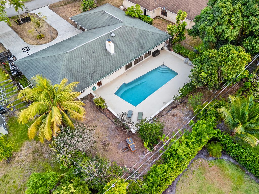 Photo of 115 NE Caprona Avenue, Port Saint Lucie, FL 34983 (MLS # R11163939)