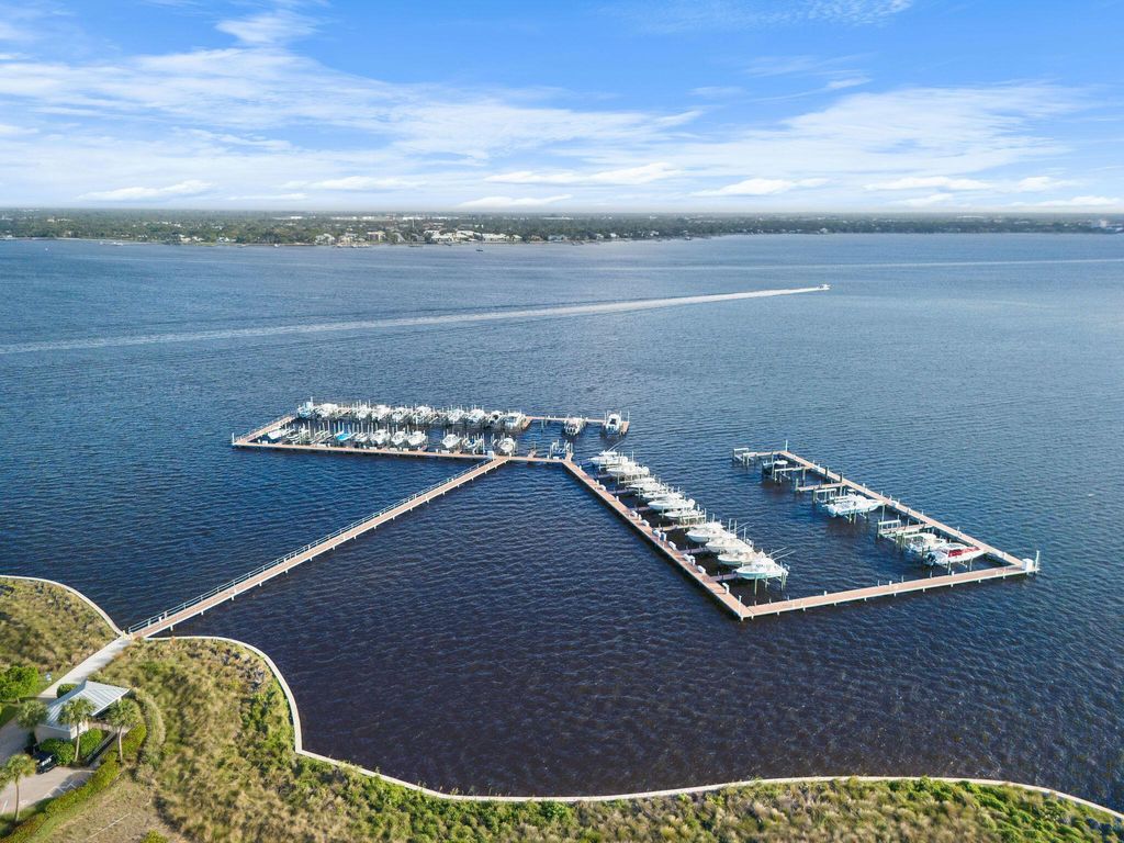 Photo of 2534 NE Evinrude Circle, Jensen Beach, FL 34957 (MLS # R11095313)