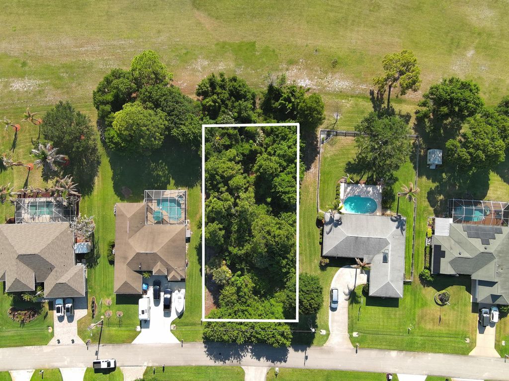Photo of 5203 Indian Bend Lane, Fort Pierce, FL 34951 (MLS # B26027968)