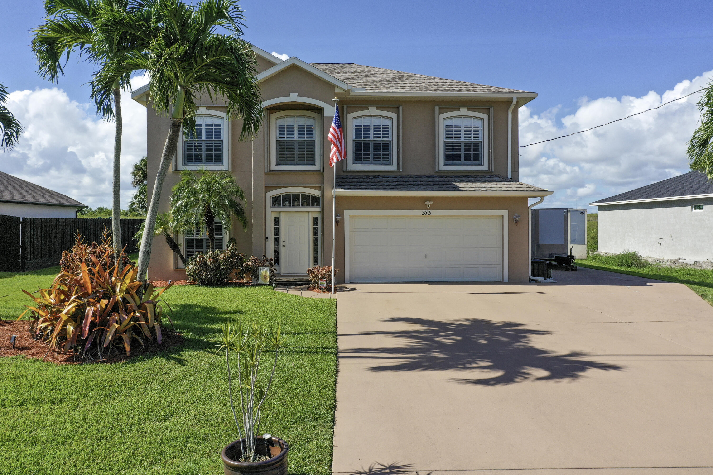 🔥MOVE-IN READY & PACKED WITH UPGRADES!🔥 Don't miss this incredible 4-bedroom, 2.5-bath, 2-story, completely CBS home in one of PSL's most desirable locations! Situated on a large canal-front lot, this rare beauty features accordion shutters throughout, making hurricane preparedness a breeze. Inside, Bahama shutters add both functionality and charm. Enjoy a spacious screened-in back porch, covered BBQ porch, and a wide-open floor plan--perfect for entertaining all year round-in any weather. Additional highlights include a security system, RV hookups, plenty of room to roam, and close proximity to top shopping and dining. This home truly has it all--see the attachment for a full list of upgrades! Homes like this WON'T LAST! Schedule your showing now before IT'S TOO LATE!!