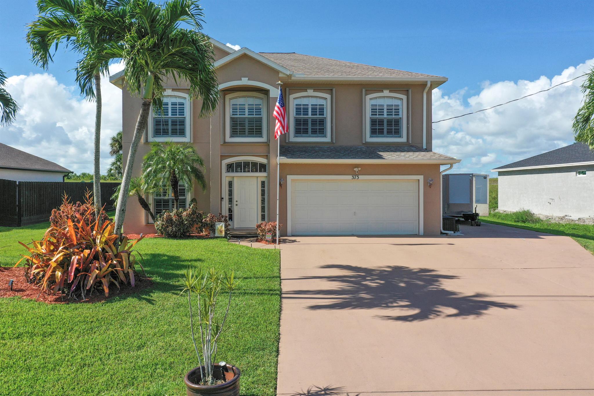 🔥MOVE-IN READY & PACKED WITH UPGRADES!🔥 Don't miss this incredible 4-bedroom, 2.5-bath, 2-story, completely CBS home in one of PSL's most desirable locations! Situated on a large canal-front lot, this rare beauty features accordion shutters throughout, making hurricane preparedness a breeze. Inside, Bahama shutters add both functionality and charm. Enjoy a spacious screened-in back porch, covered BBQ porch, and a wide-open floor plan--perfect for entertaining all year round-in any weather. Additional highlights include a security system, RV hookups, plenty of room to roam, and close proximity to top shopping and dining. This home truly has it all--see the attachment for a full list of upgrades! Homes like this WON'T LAST! Schedule your showing now before IT'S TOO LATE!!