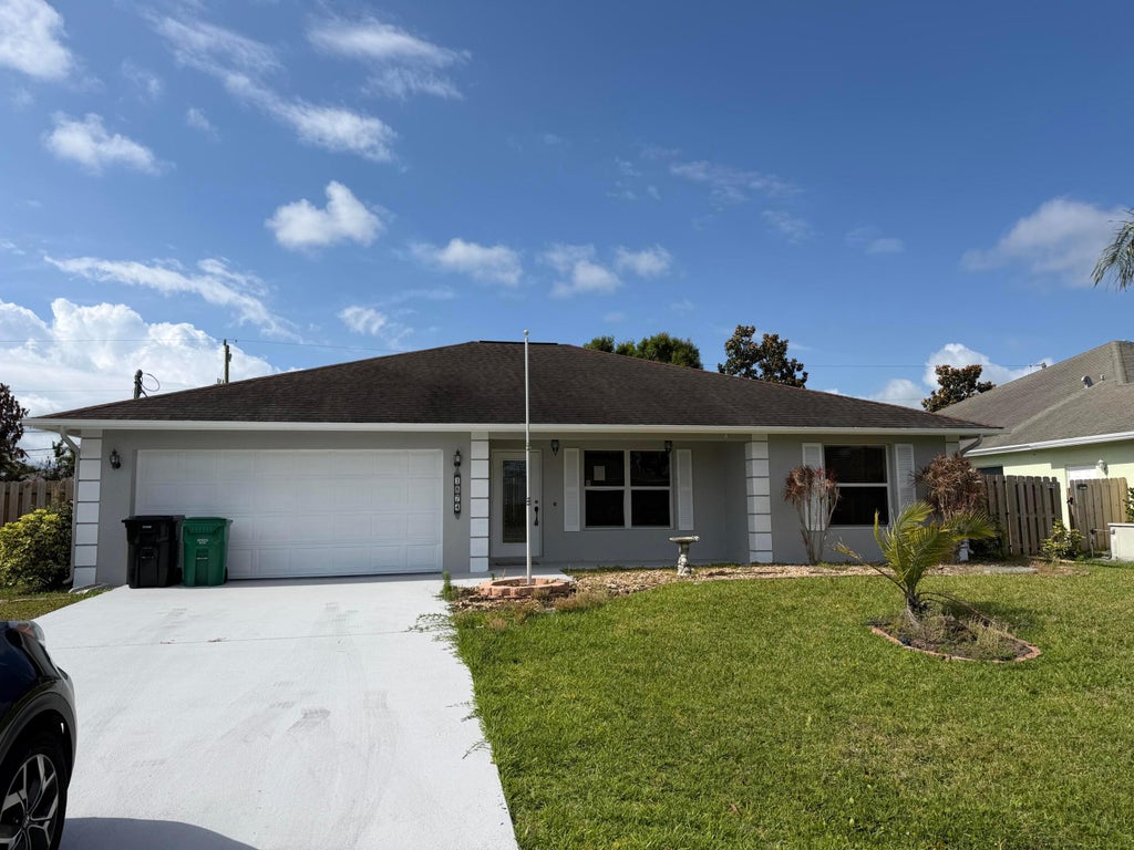 Photo of 1874 SW Capehart Avenue, Port Saint Lucie, FL 34953 (MLS # F10554101)
