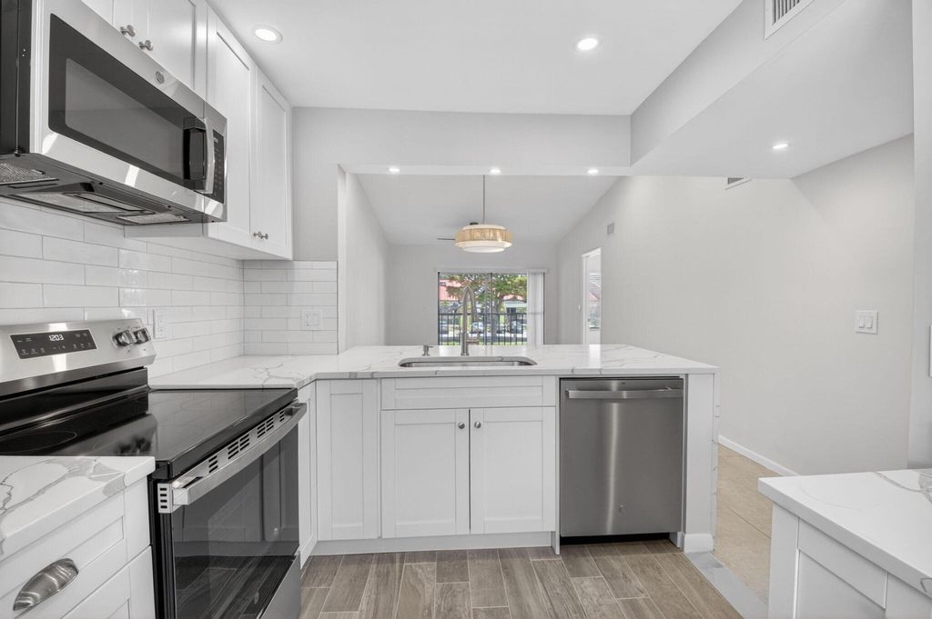 Photo of 6649 Somerset Drive #206, Boca Raton, FL 33433 (MLS # B26025735)