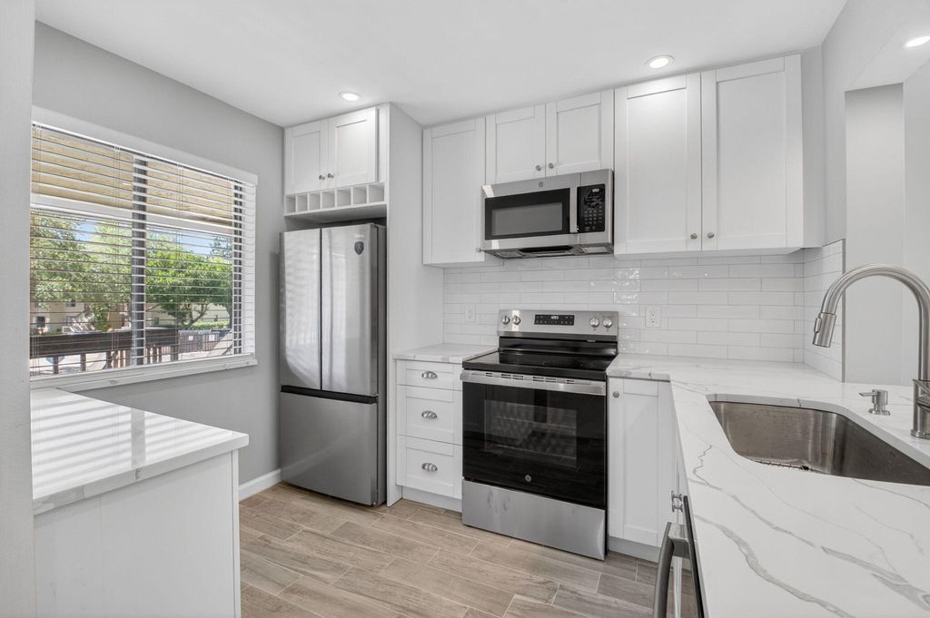 Photo of 6649 Somerset Drive #206, Boca Raton, FL 33433 (MLS # B26025735)