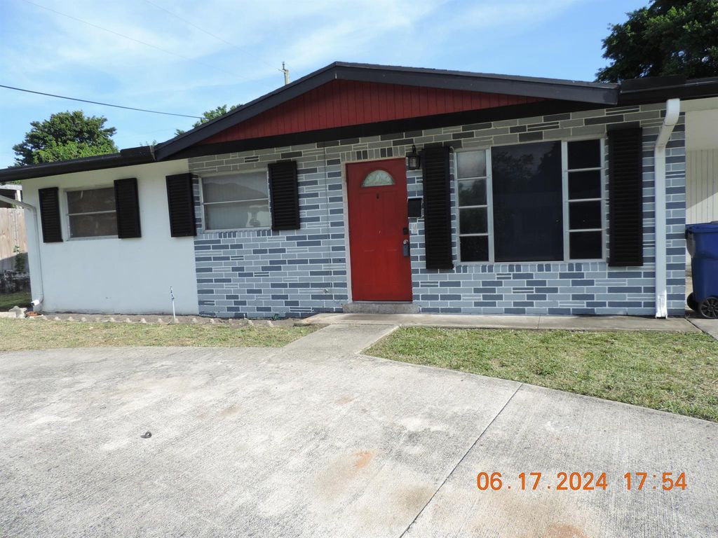 Photo of 1611 W 35th Street, Riviera Beach, FL 33404 (MLS # R10973403)