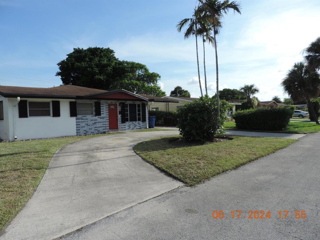 Photo of 1611 W 35th Street, Riviera Beach, FL 33404 (MLS # R10973403)