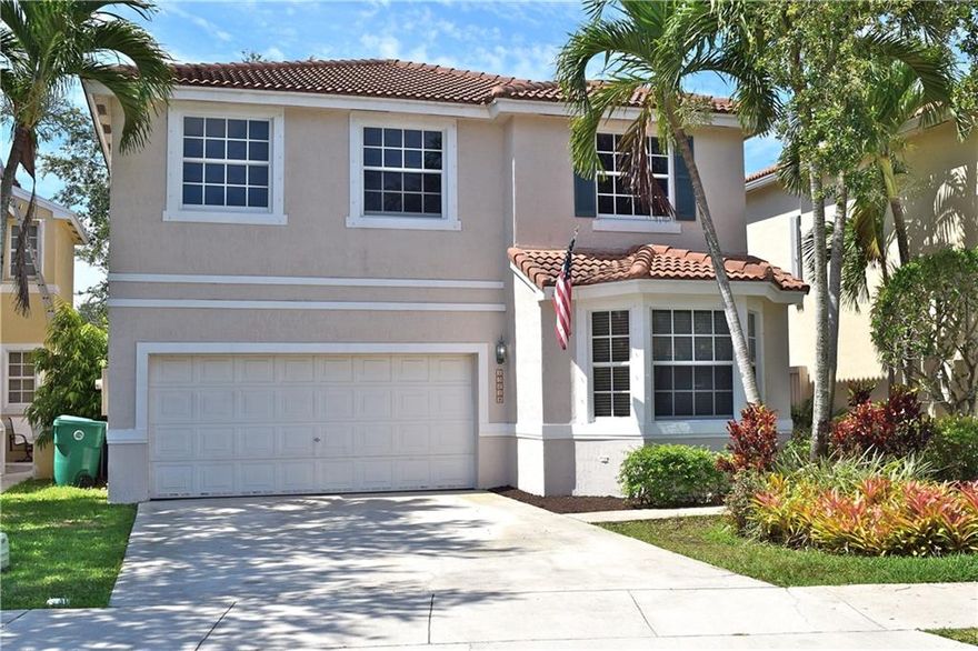 Well maintained home located in desirable West Davie gated community. This home is offers spacious living area w/soaring high ceiling in living room featuring lg windows which provides for beautiful natural lighting. Tile throughout main living areas. Lg open kitchen features stainless steel appliances, lot of cabinet & counter space & pantry. Downstairs offers separate living, dining & family areas. Master BR offers vaulted ceilings w/huge walk-in closet. Lg master bath features dual sinks, separate shower & spa tub. Original 4 BR floor plan--owner opted to have made into a 3 BR. Lg 3rd bedroom can be divided to bring back to 4 BR. This move in ready house sits on a great lot w/lg private backyard, covered, screened & tiled patio. Top rated schools. Low HOA fees. Hurricane panels. New A/C