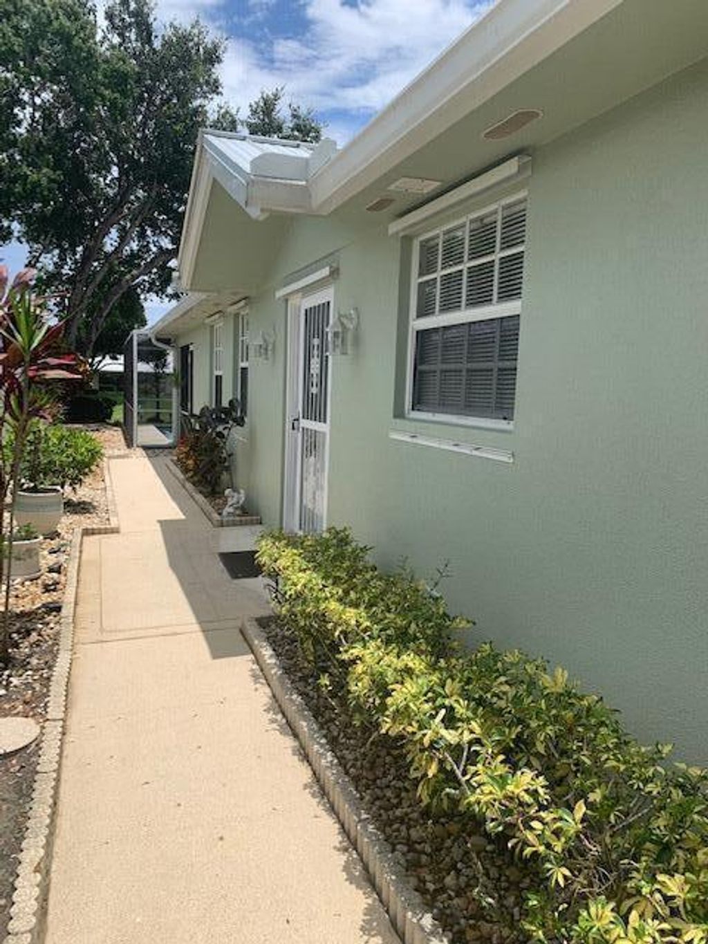 Photo of 1777 SW Waterfall Boulevard, Palm City, FL 34990 (MLS # R11105834)