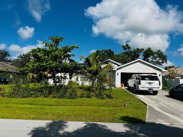This is a dream home with so much real estate/space to keep building. 3/2 with a formal living room and a play room for the kids or to make an addition. Master bathroom with a jacuzzi tub, 2 car garage, big back yard, solar panel, and water treatment system.