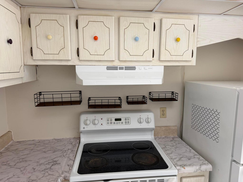 Photo of 500 W Village Green Cir Circle W #212, Palm Springs, FL 33461 (MLS # B26037912)