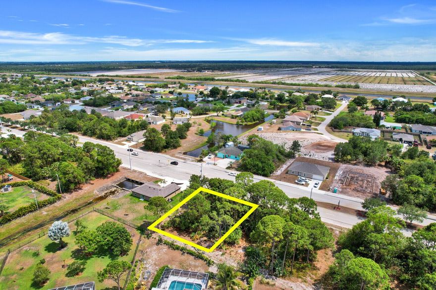 Discover the great potential of this spacious vacant lot, ideally situated for your dream home or investment property! Located in the heart of Port St. Lucie, this lot provides quick access to I-95 and the Florida Turnpike, ensuring easy commutes and convenient connections to shopping, dining, and entertainment.  Set in a developing community, it offers a peaceful neighborhood while being close to the vibrant local amenities. Enjoy the natural surroundings with nearby parks, golf courses, and recreational activities just minutes away.  Don't miss out on this incredible opportunity to build your perfect retreat in a highly desirable area. Take action today and start planning your future in this beautiful part of Florida!