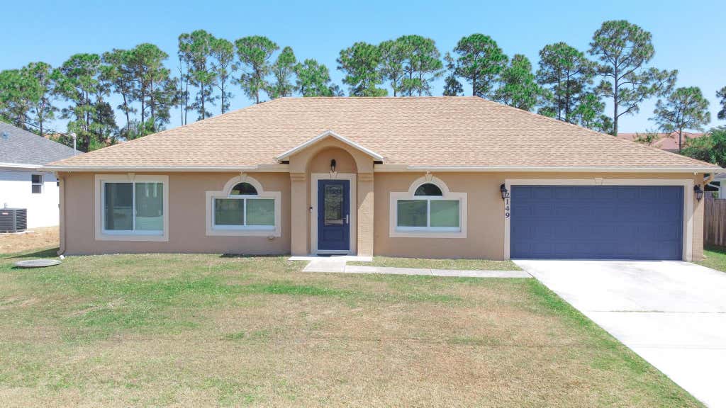 Photo of 2149 SW Fears Avenue, Port St Lucie, FL 34953 (MLS # R10916305)