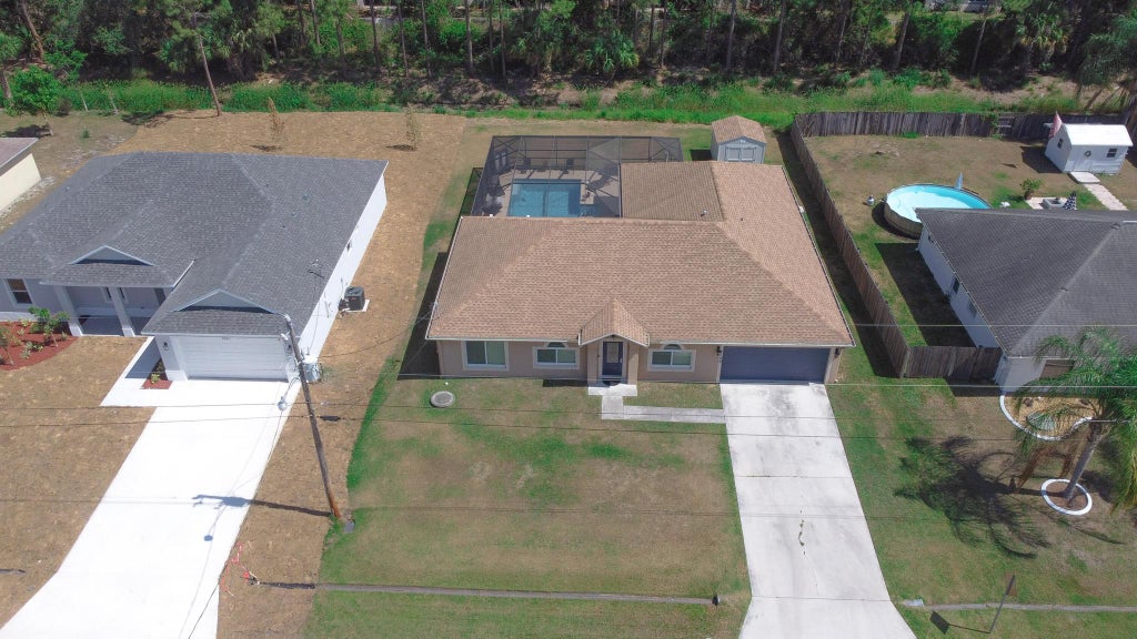 Photo of 2149 SW Fears Avenue, Port St Lucie, FL 34953 (MLS # R10916305)