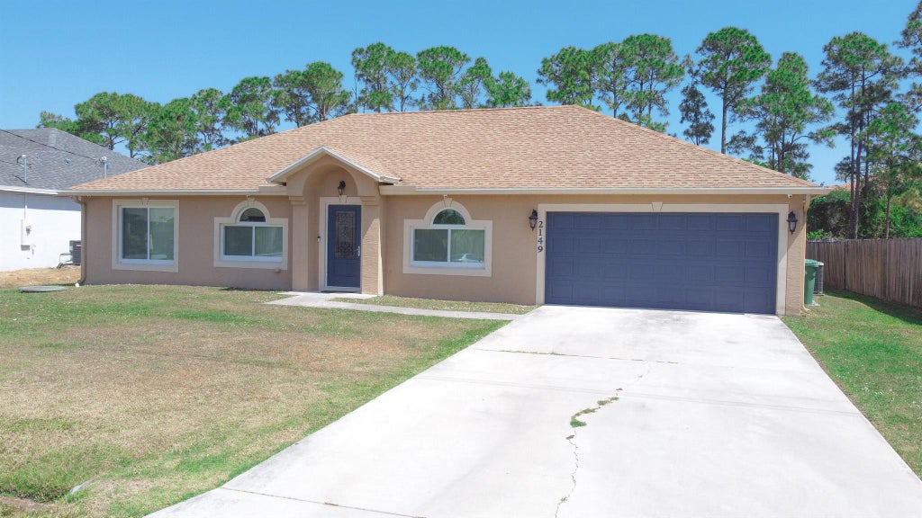 Photo of 2149 SW Fears Avenue, Port St Lucie, FL 34953 (MLS # R10916305)