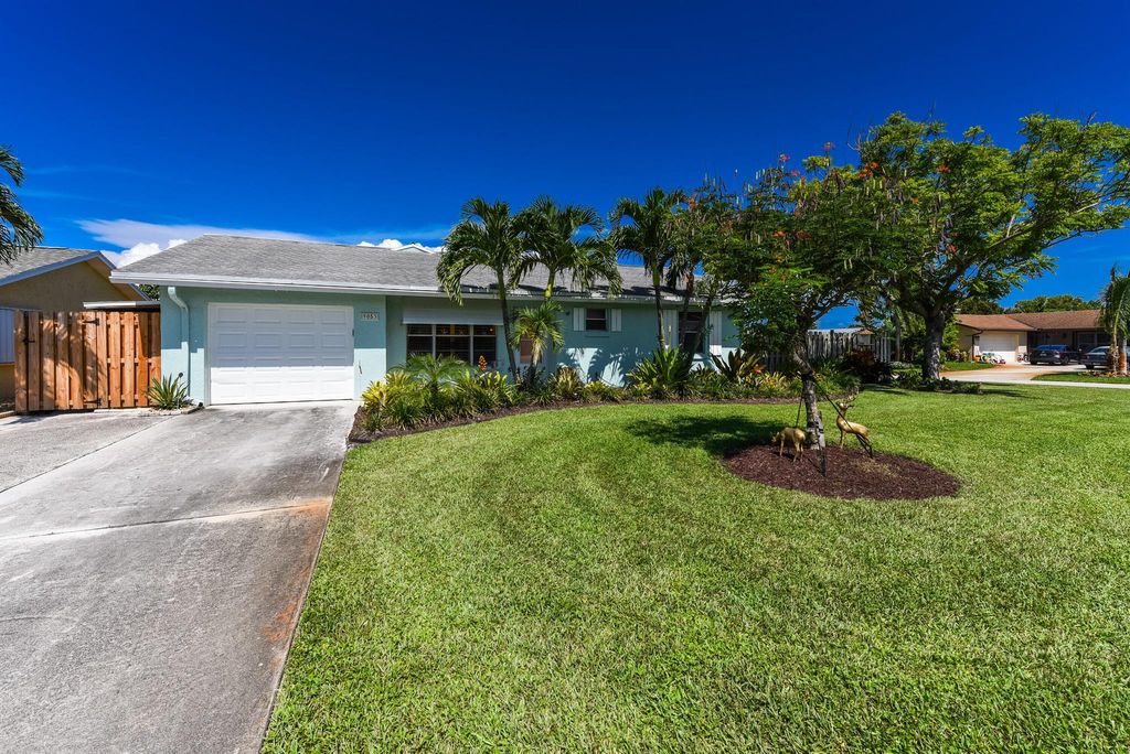 Photo of 9053 SE Sandridge Avenue, Hobe Sound, FL 33455 (MLS # R10909065)
