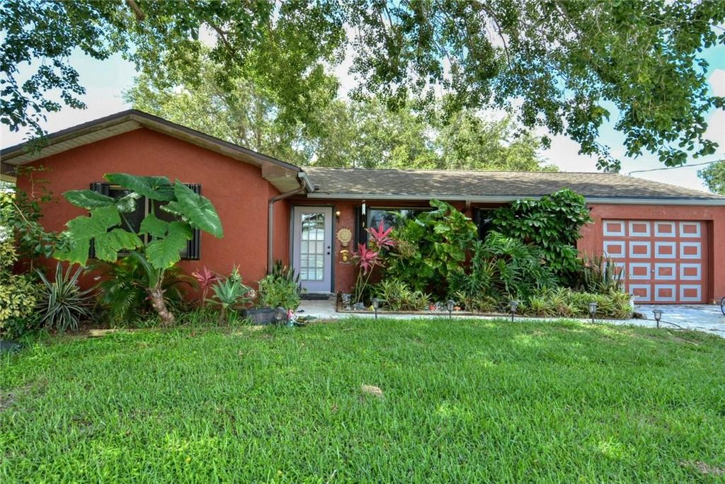 Photo of 2520 SE Tiger Avenue, Port Saint Lucie, FL 34952 (MLS # F10434332)